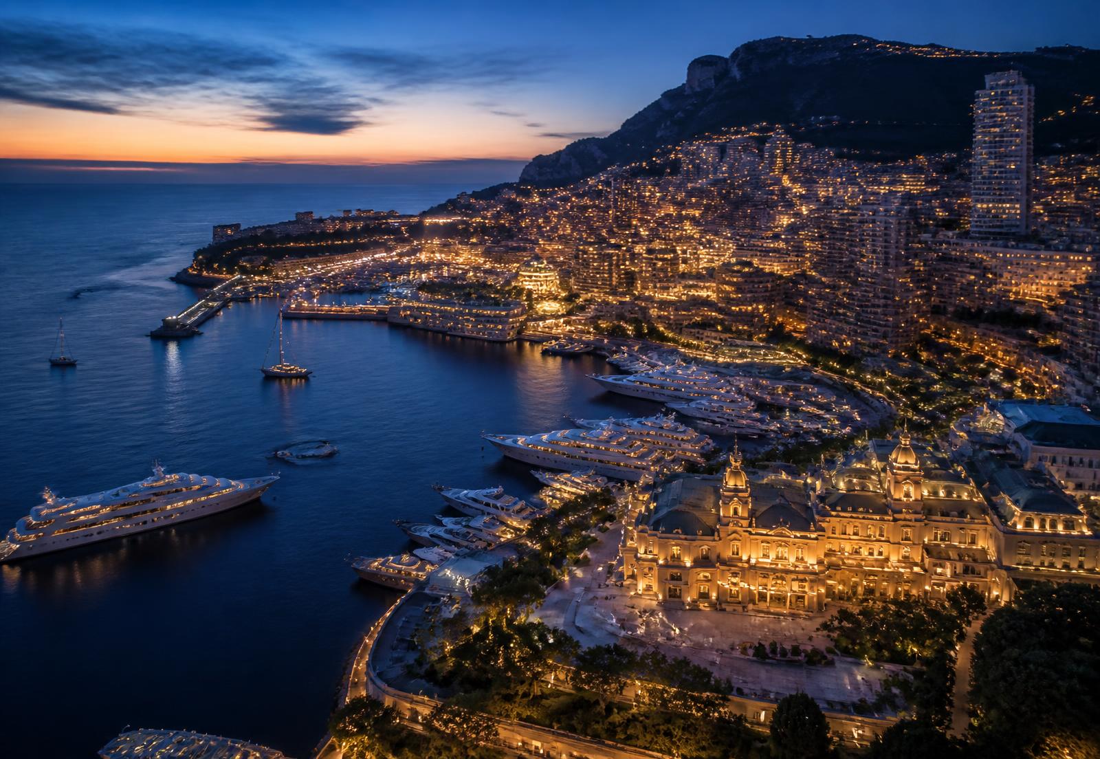 Monaco harbour and coastline at dusk